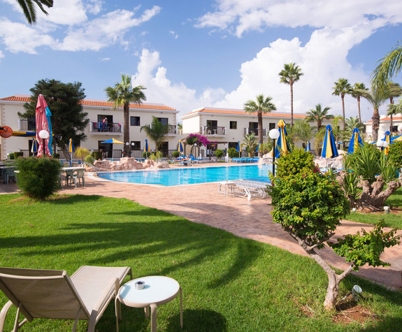 Loutsiana Hotel pool, sunbeds and view of the hotel